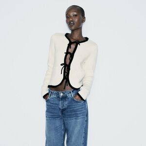 Chic White Cardigan with Black bow